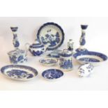 A selection of blue-and-white 'Willow' pattern china to include a covered round dish (Gibson & Son),