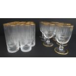 A set of 14 Murano fluted water glasses with gilded rims (14 cm) and 7 matching wines. (Two water
