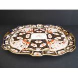 A large Royal Crown Derby porcelain serving tray: hand-gilded and decorated in the Imari palette (