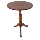 A 19th century circular-topped mahogany occasional table: turned stem and tripod base (48 cm in