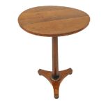 A circa 1840 rosewood occasional table: circular top above tapering octagonal stem leading to