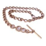 A 9-carat rose gold curb link watch chain each stamped '9-375' with 'T' bar and swivel (length 47cm,