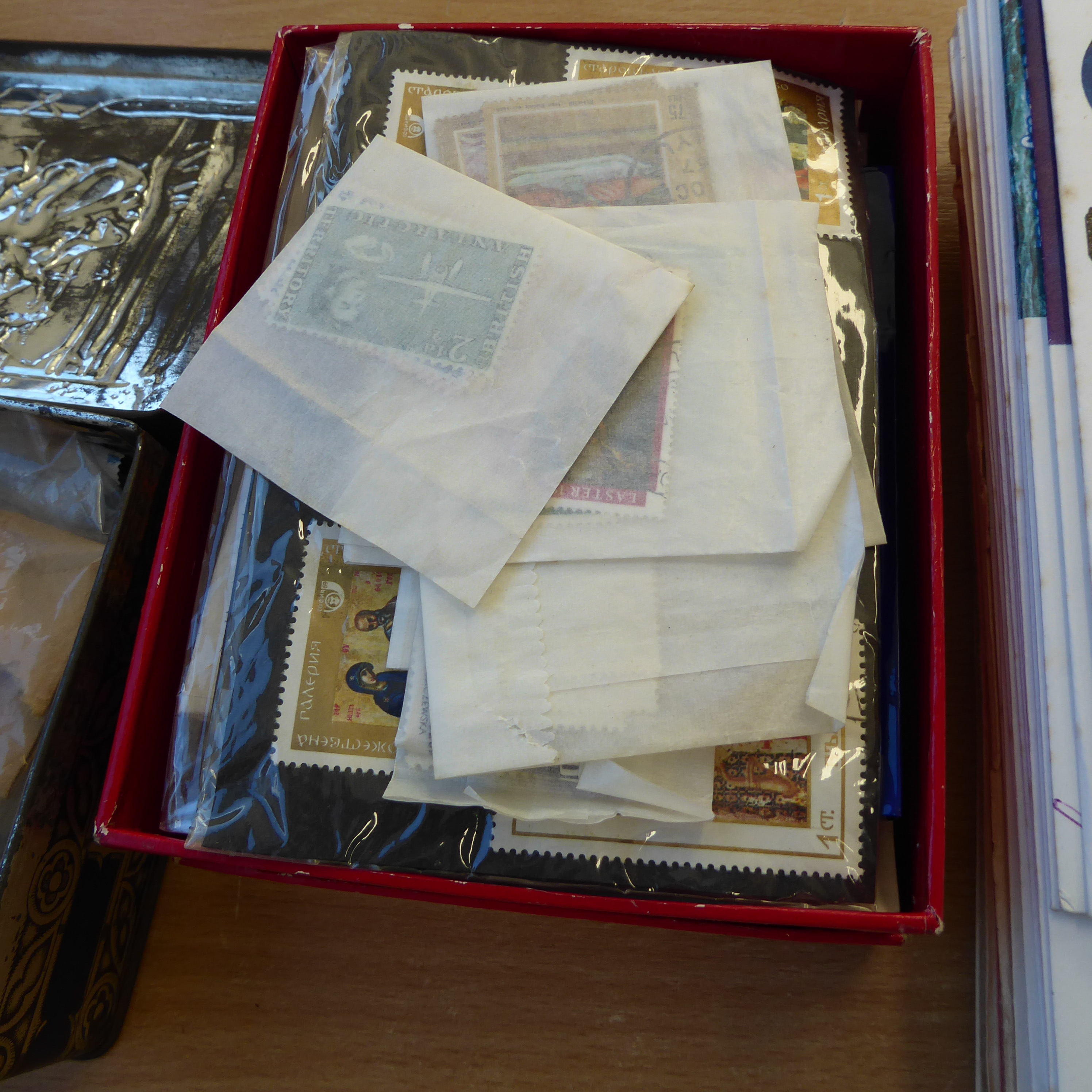 Two boxes of loose stamps in packets and tins, plus First Day Covers etc. - Image 4 of 16