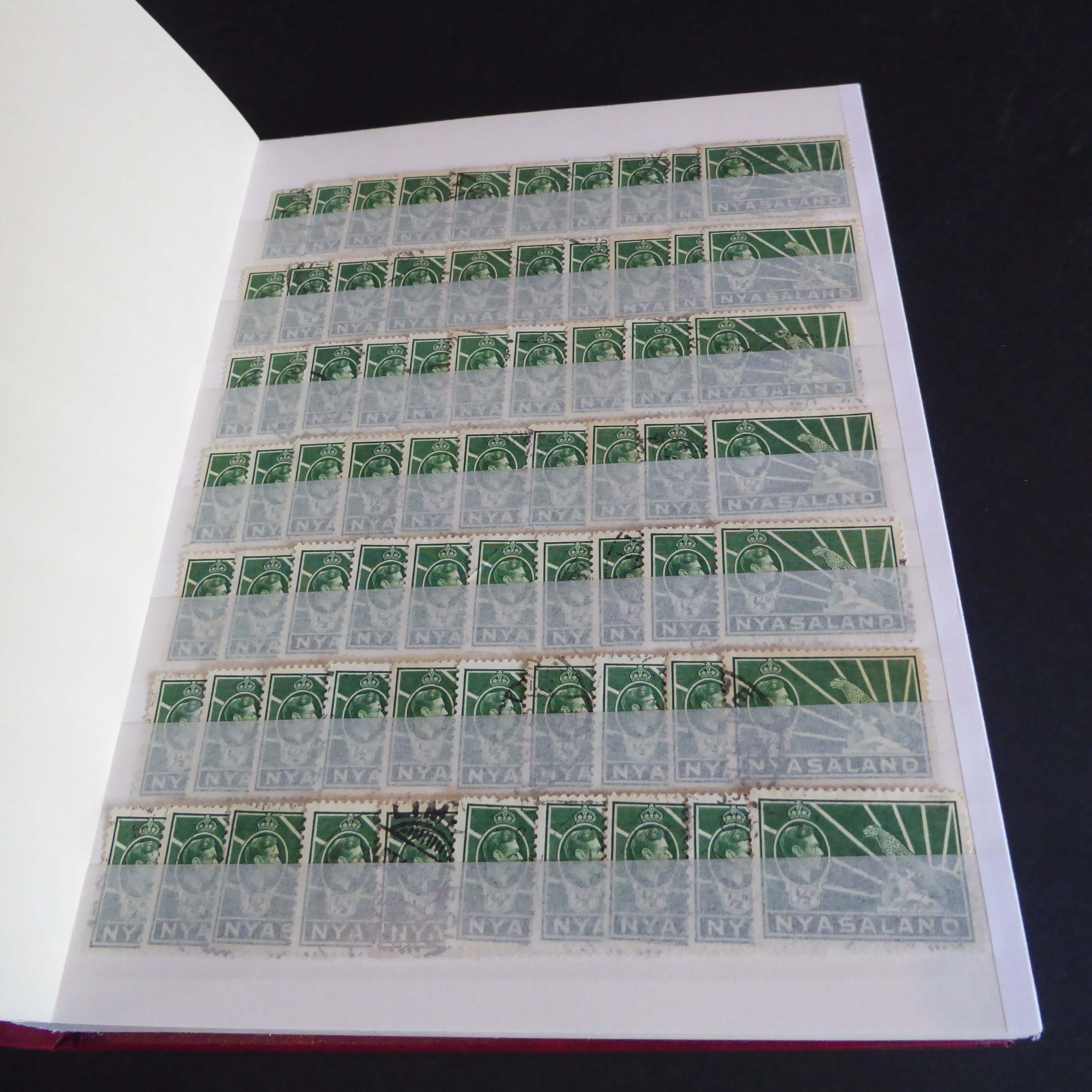 A Stanley Gibbons stockbook containing stamps of Nyasaland (more than 1,000 stamps with some - Image 2 of 14