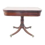 An early 19th century Regency period mahogany, brass-strung and rosewood-crossbanded foldover-top