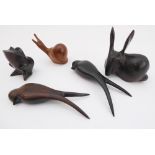 JOHN MAINWARING - a collection of five hand-carved birds and animals to include a pair of swallows