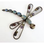 A good, large and unusual silver (stamped 925) brooch in the form of a dragonfly: multi gem-set with