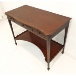 A late 18th century serpentine-topped mahogany and rosewood crossbanded side table: larger central