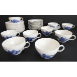 A 33-piece Royal Copenhagen 'Blue Flower #10' china tea service comprising 9 large cups and