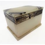 An early 20th century Art Deco style silver-mounted, polished hardstone box, assayed London probably