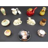 Eleven miniature ceramics to include: a pair of 19th century Staffordshire-style recumbent lambs (