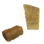 A heavy and interesting early tablet fragment (probably marble) with four lines of early carved text