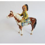 A Beswick ceramic model of a Native American chief on horseback, black printed mark to underside (