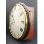 A 19th century circular mahogany-cased schoolmaster-style clock: the cream dial with Roman