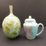 A Ruskin Pottery jug-and-cover with lustreware-style glaze. Together with an unusual studioware