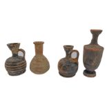 A mixed group of four miniature blackware ceramics (terracotta vessels), probably Greek circa 3rd to