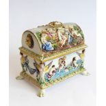 A modern Capo di Monte porcelain dome-topped casket decorated in high relief with classical style
