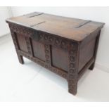 A panelled oak chest of small proportions and good colour (probably late 17th century): original
