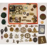 A good selection of WWI and later military and civilian badges and buttons to include: a German