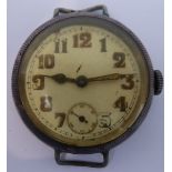 An early 20th century gentleman's wristwatch in military style: cream dial with Arabic numerals