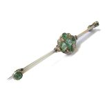 An Edwardian beryl and diamond-set bar brooch, the central millegrain-edged cluster set with
