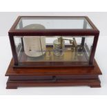 An early 20th century mahogany barograph: the full-width drawer below with spare charts (37 cm