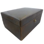 An early 20th century green leather upholstered jewellery box containing a variety of mostly costume