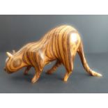 JOHN MAINWARING - a fine wooden carving of a big cat stalking carved from zebrano wood, carved