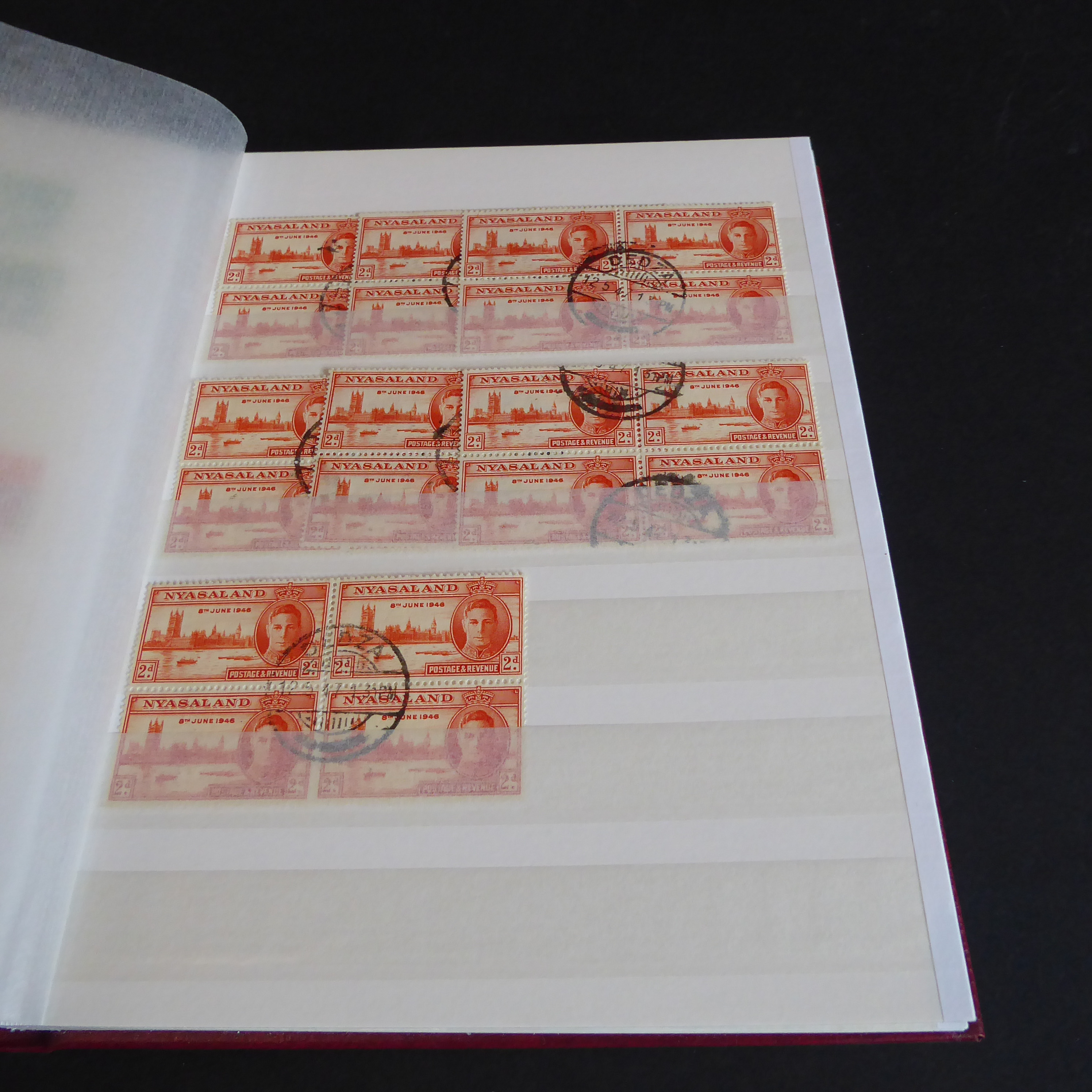 A Stanley Gibbons stockbook containing stamps of Nyasaland (more than 1,000 stamps with some - Image 10 of 14
