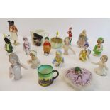 An assortment of ceramics to include: ten Art Deco period and other porcelain pincushion half-dolls;
