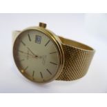 A gentleman's gold-plate-cased dress wristwatch: the gold-coloured dial signed 'Jean Renet -