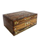 A mid-19th century coromandel jewellery box: mother of pearl and brass inlaid; the hinged lid with