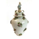 A late 19th to early 20th century continental baluster-shaped porcelain vase and cover (probably