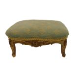 A small 19th century carved gilt-wood footstool in mid-18th century Louis XV style: needlework