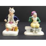 A pair of 18th century Derby porcelain figure models: male and female figures (the 'Welch Taylor
