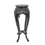 An early 20th century Chinese hardwood and circular marble-topped jardinière stand (possibly