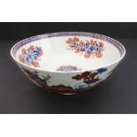 An 18th century Chinese porcelain bowl: hand-gilded and decorated in iron oxide reds and cobalt