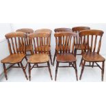 A good harlequin set of eight late 19th century lathe-back chairs with patinated elm seatsThis a