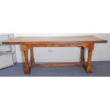 A good refectory table: finely figured and patinated thick two-plank walnut top with cleated ends;