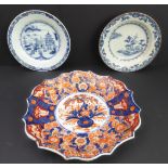 Two 18th century Chinese export ware dishes typically decorated in underglaze blue and a 19th