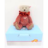 A Steiff teddy bear in its original box