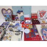 An interesting and varied selection of royal commemorative memorabilia to include calendars, paper