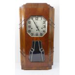 An Art-Deco-style walnut-cased eight-day wall-hanging clock: silvered dial with Arabic numerals