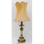 A fine quality modern brass lamp and shade with pineapple finial above spreading leaves (56cm