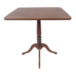 A reproduction mahogany occasional table in Georgian style, raised on four splayed feet (the top