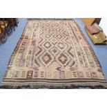 A large flatweave kilim (347 x 237 cm) with 1989 Liberty of Regent Street invoice for £595.