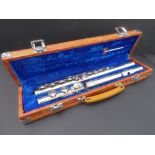 A silver-plated flute by the Lark Company in its case