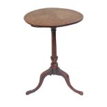 An antique oak circular-topped occasional table: slender turned stem and on tripod base (42.5 cm