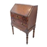 An unusual late 18th / early 19th century oak and crossbanded writing bureau of small proportions: