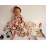 To be sold in aid of the Marie Curie charity: a mid-20th century china-headed doll together with